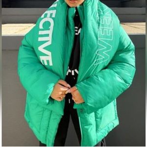 Green puffer jacket with detachable scarf
